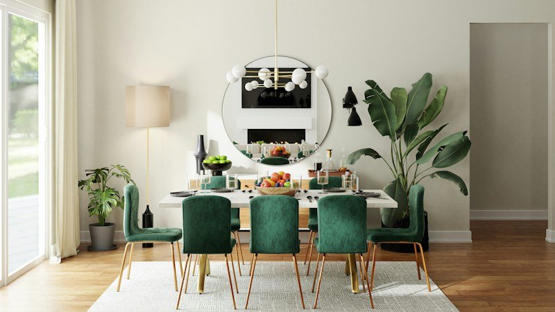 Dining table set with green upholstered chairs and pendant lighting